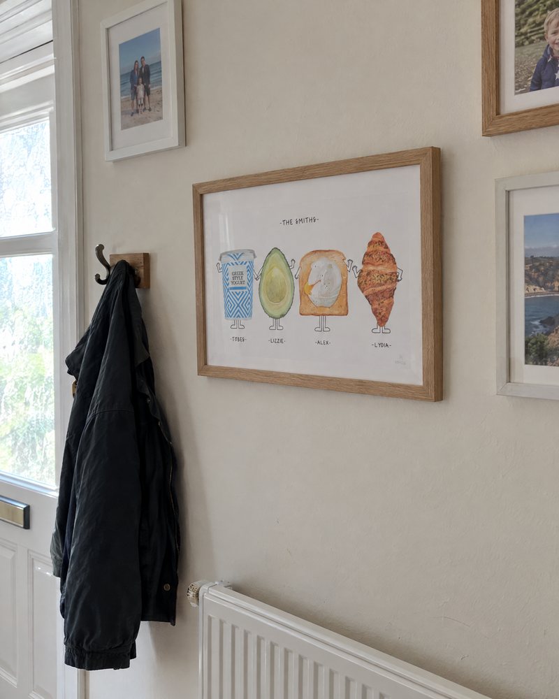 Framed Munch for Four print in a family hallway